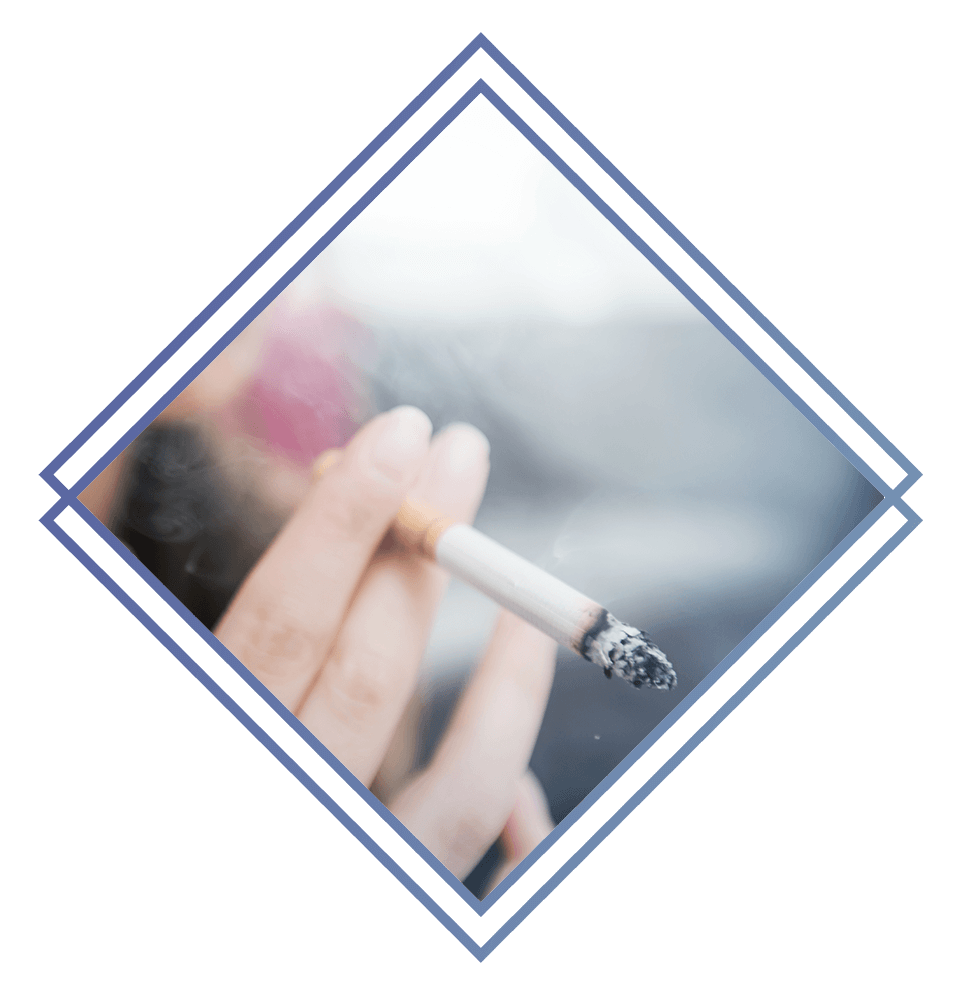 close up frame of someone smoking a cigarette