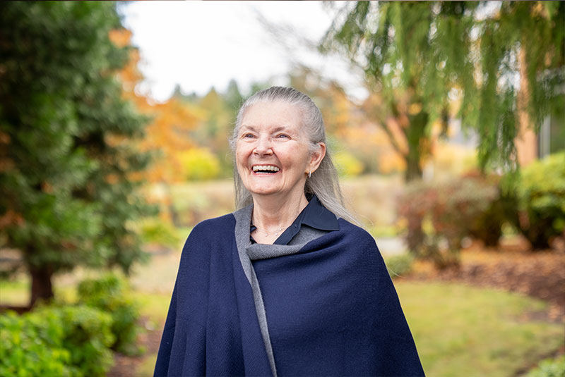 patient smiling brightly after their dental implant treatment